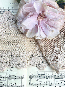 Vintage rose lace. Pale antique