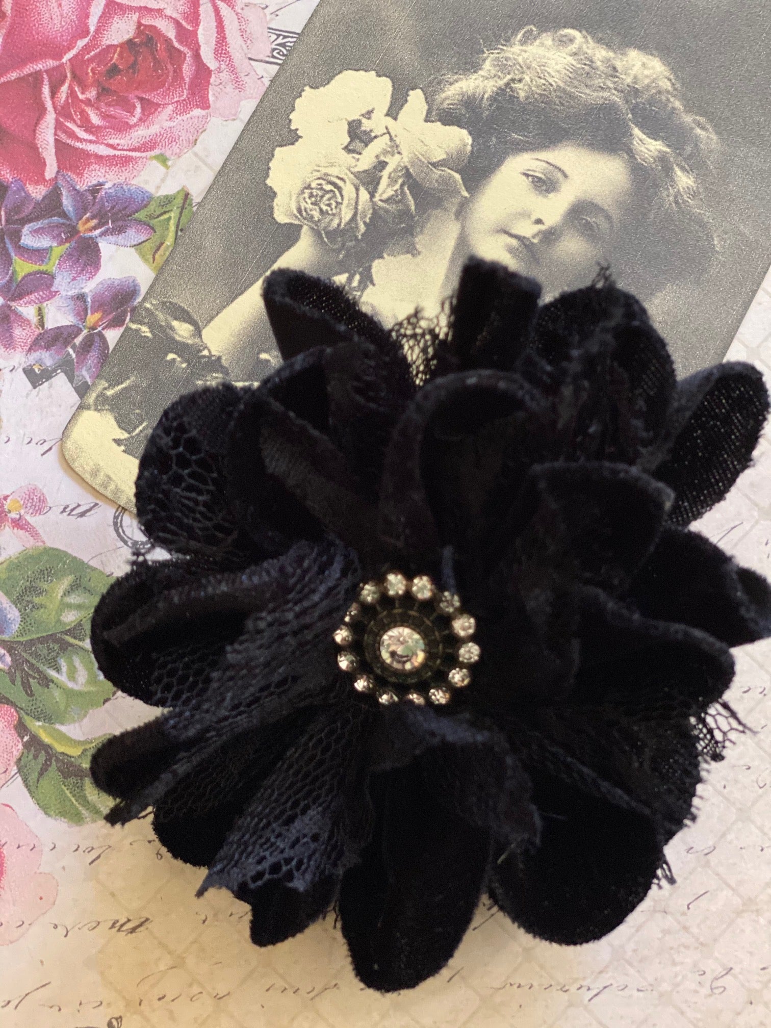 Black flower deals brooch