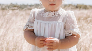 Heirloom Cherub Lace baby dress . Blush & cream