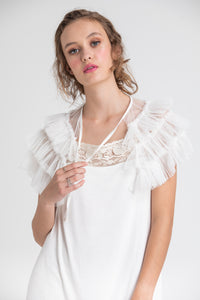 ruffled tulle Faerie cape in icing sugar white.