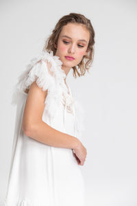 ruffled tulle Faerie cape in icing sugar white.